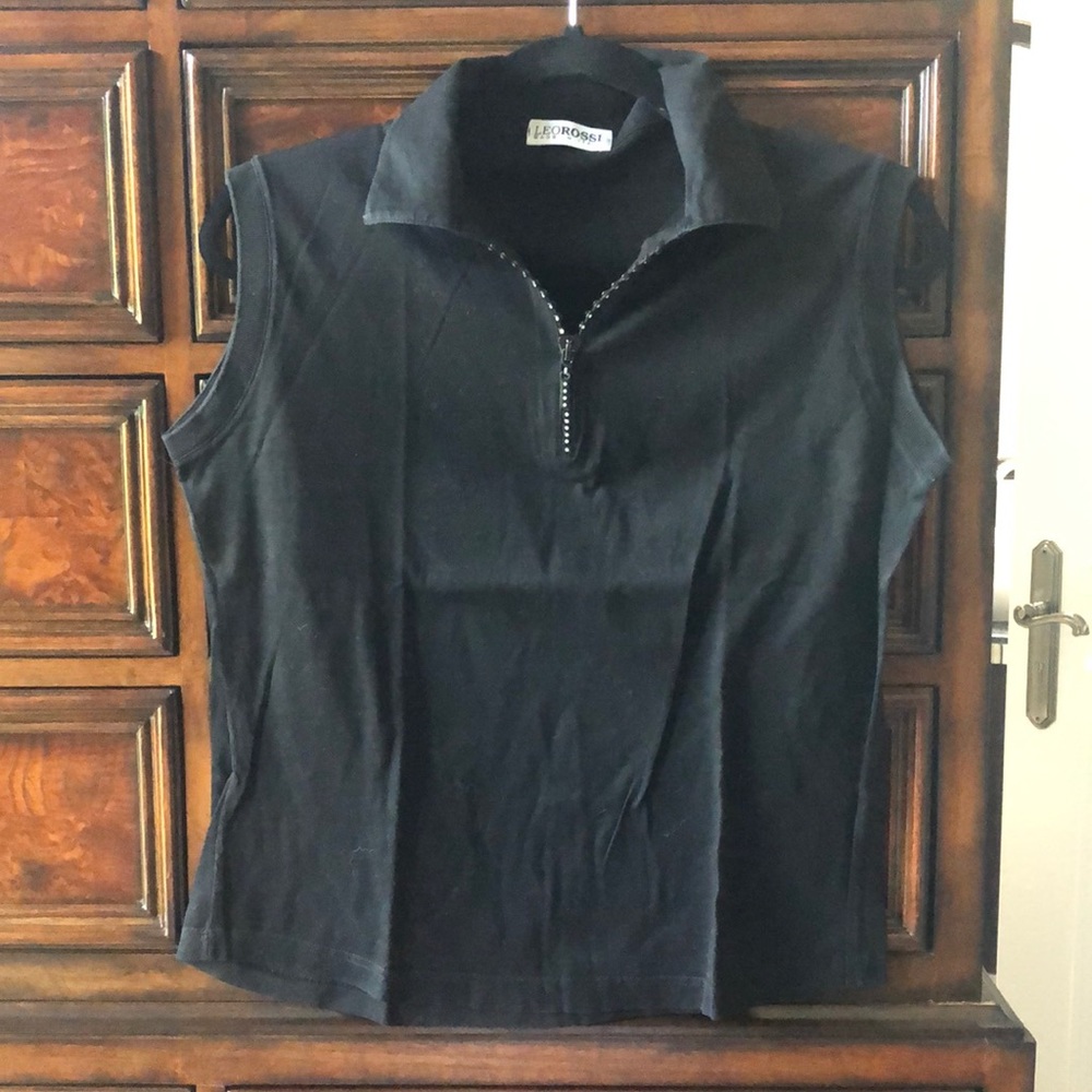 Sleeveless black top cotton top with decorative zipper at front and collar.